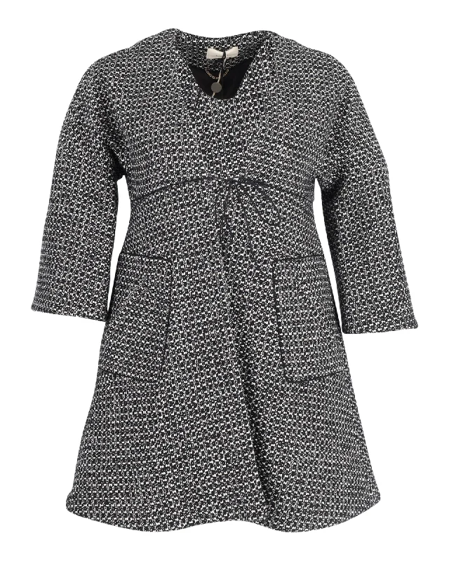 Women's reversible down coats with two - tone designs for versatile styling Ba&Sh Textured Short Coat in Black and White Cotton Women's reversible down coats with two - tone designs for versatile styling Ba&Sh Textured Short Coat in Black and White Cotton