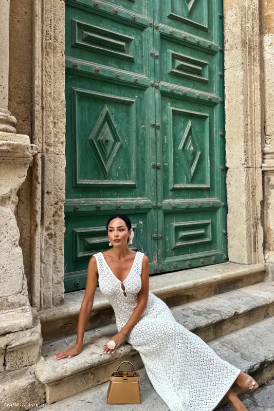 Ruffled maxi dresses with a tiered skirt for added volume Carter Crochet Sleeveless Maxi Dress - White Ruffled maxi dresses with a tiered skirt for added volume Carter Crochet Sleeveless Maxi Dress - White