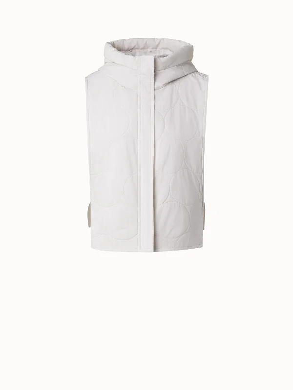 Women's quilted puffer jackets in a cropped silhouette for a modern twist  Dot Quilt Gilet with Hood