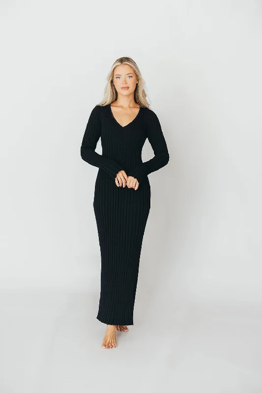 Maxi dresses with side slits for a touch of allure Berkeley Ribbed Knit Maxi Dress With V-Neck in Black Maxi dresses with side slits for a touch of allure Berkeley Ribbed Knit Maxi Dress With V-Neck in Black
