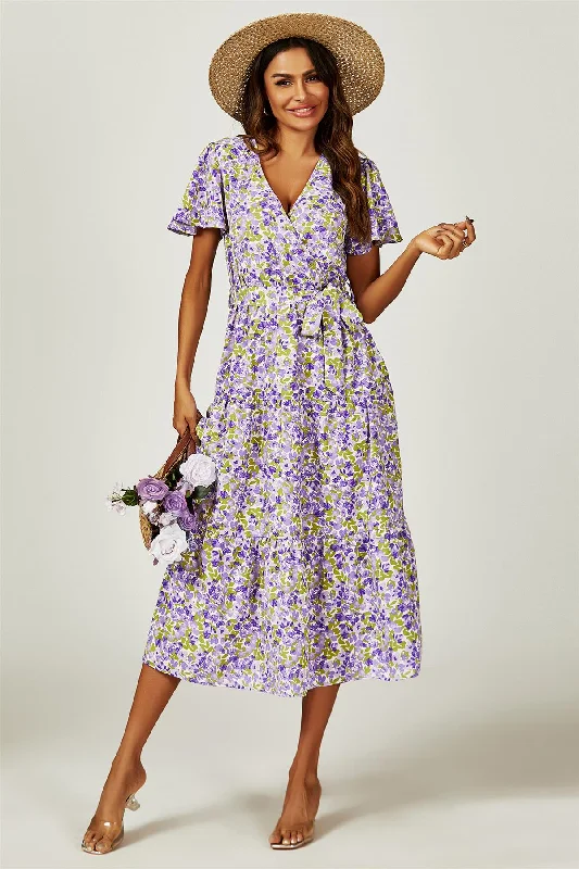 Midi dresses with ruffled sleeves for a more feminine and voluminous look Floral Print Hem Tiered Wrap Midi Dress In Purple Midi dresses with ruffled sleeves for a more feminine and voluminous look Floral Print Hem Tiered Wrap Midi Dress In Purple