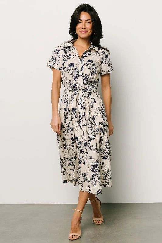 Midi dresses with mesh inserts for a trendy and breathable option Lorna Midi Dress | Beige + Navy Print Midi dresses with mesh inserts for a trendy and breathable option Lorna Midi Dress | Beige + Navy Print