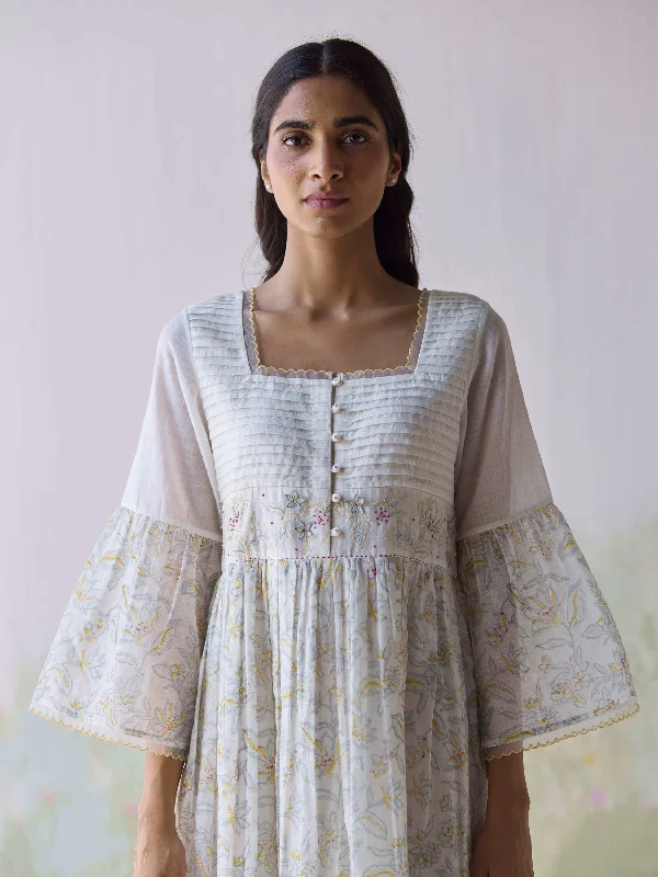 Midi dresses with ruffled bodices for a more pronounced feminine look Matilda Pleat Midi Dress